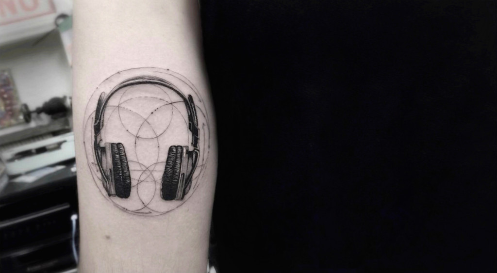 Headphones tattoo by Dr. Woo